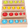Jeu d'emboîtement de cylindres colorés Jeu d'emboîtement de cylindres colorés